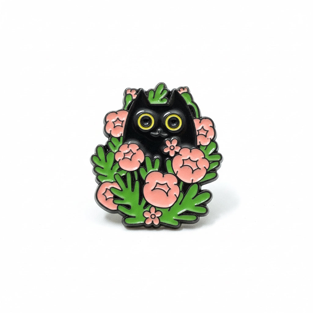 Black Kitty in a rose bush