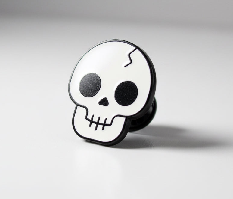 Happy skull face enamel pin