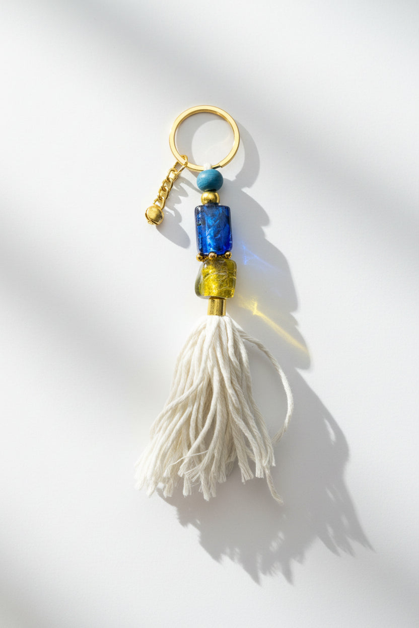 Keychain with beads and tassel on a white background